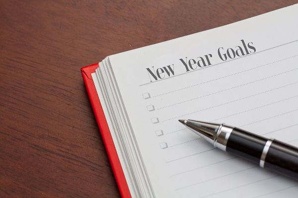 Book with "New Year Goals" written in it